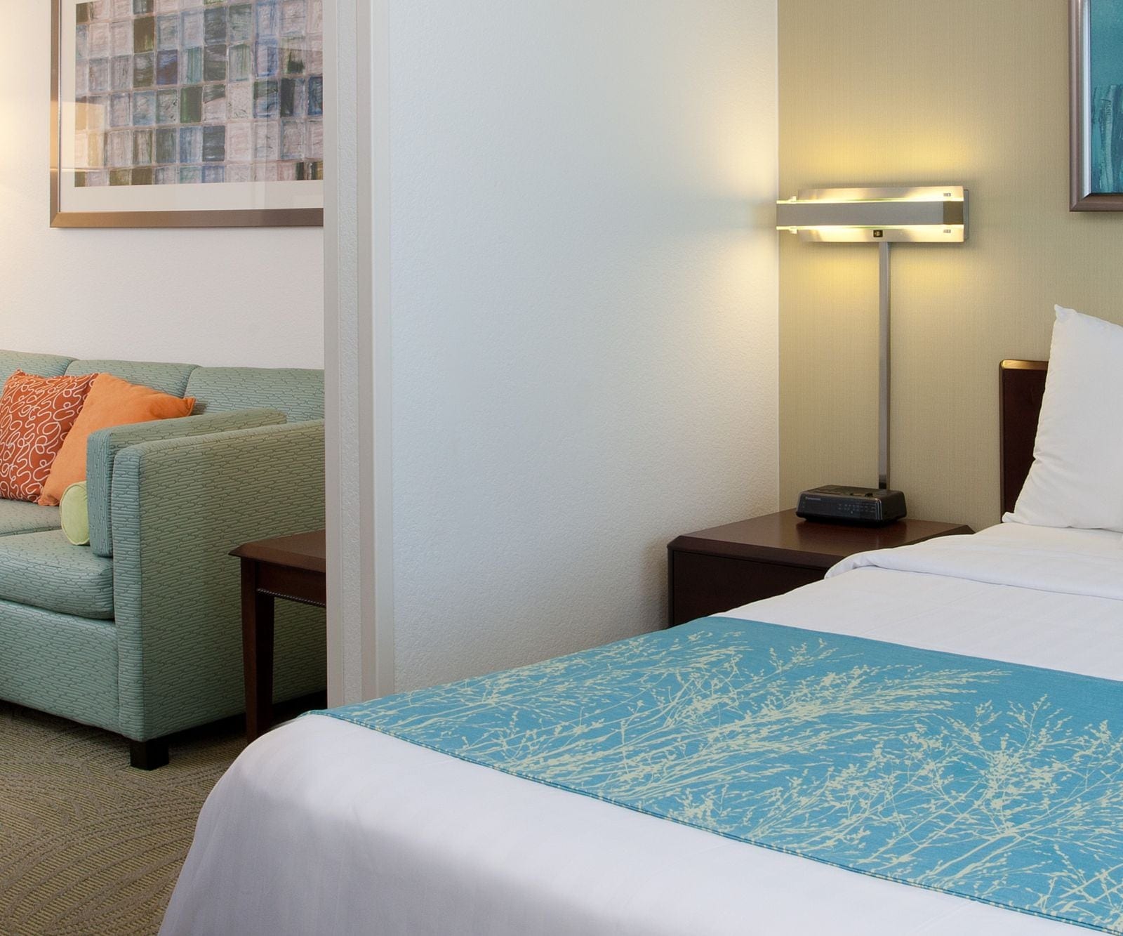 King suite at SpringHill Suites Los Angeles LAX/Manhattan Beach with a separate living area and sofa bed