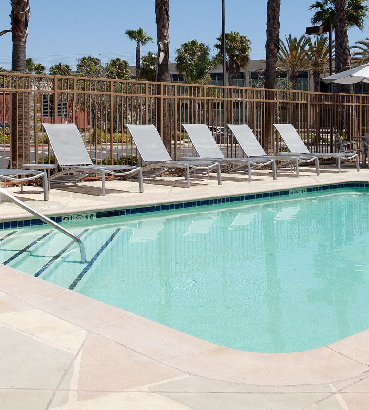Outdoor heated pool and hot tub at SpringHill Suites Los Angeles LAX/Manhattan Beach